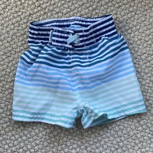 Rugged Butts baby swim shorts. Size 6-12 months